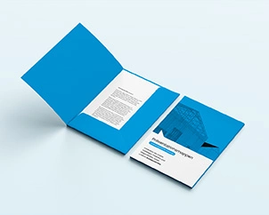 Opened presentation folder with contents lies next to closed presentation folder