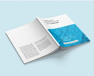 Open perfect binding with softcover in portrait format with spine facing upwards