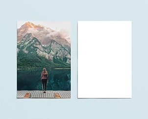 Two horizontal posters with a holiday motif show a printed front and an unprinted back